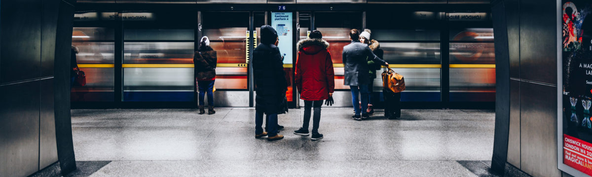 Passengers on London tube Photo by Christopher Burns on Unsplash